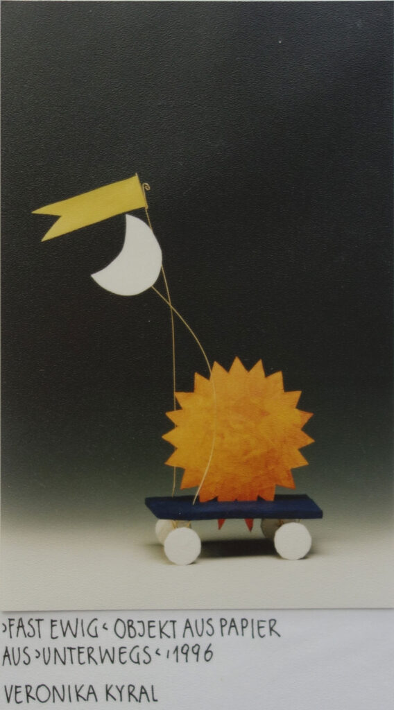 Papierkunstwerk mitt Sonne und Mond